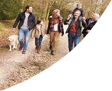 family-walking-in-the-woods-mobile